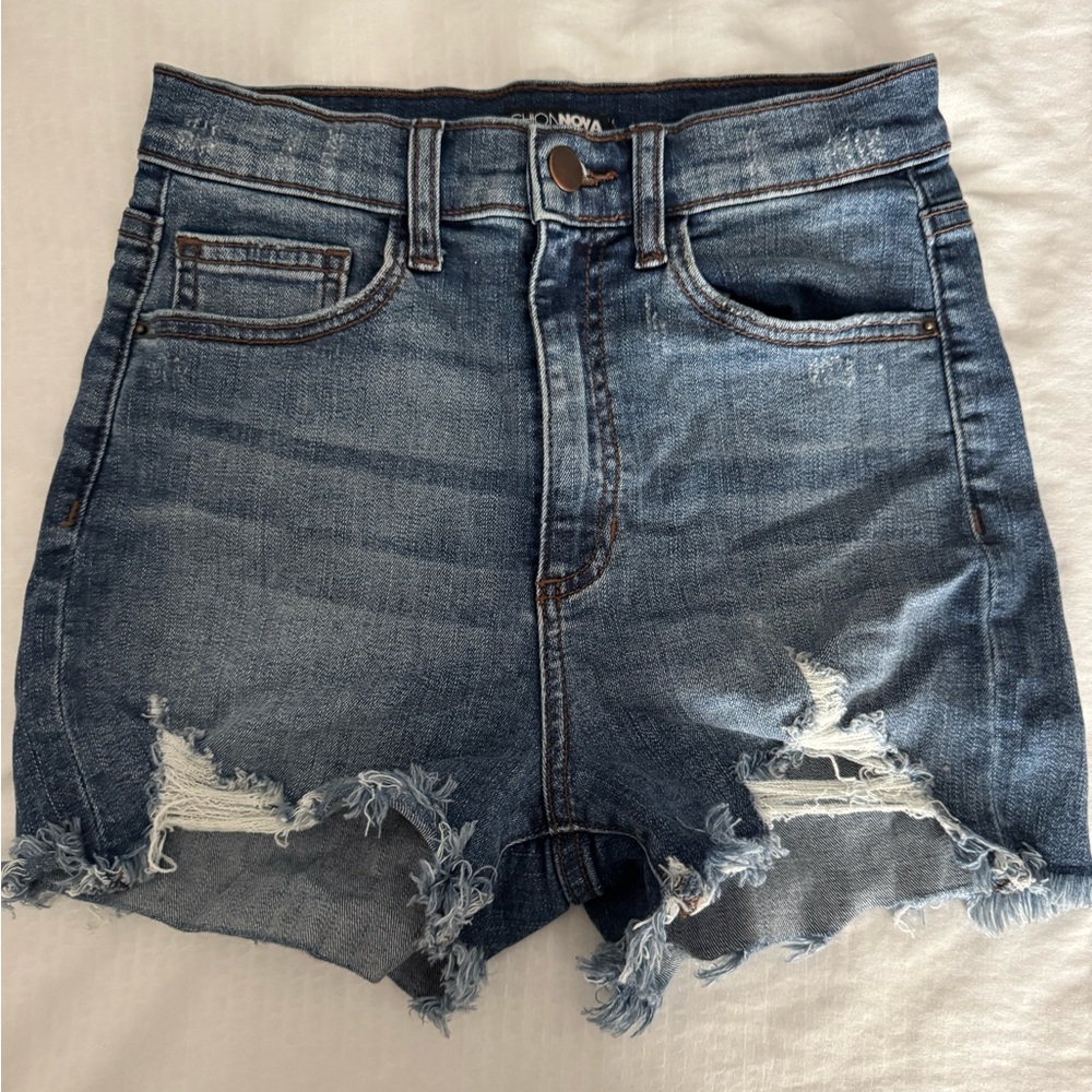 High rise distressed denim shorts